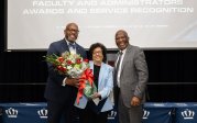 President Hemphill and Provost Agho with Professor Nina Brown.